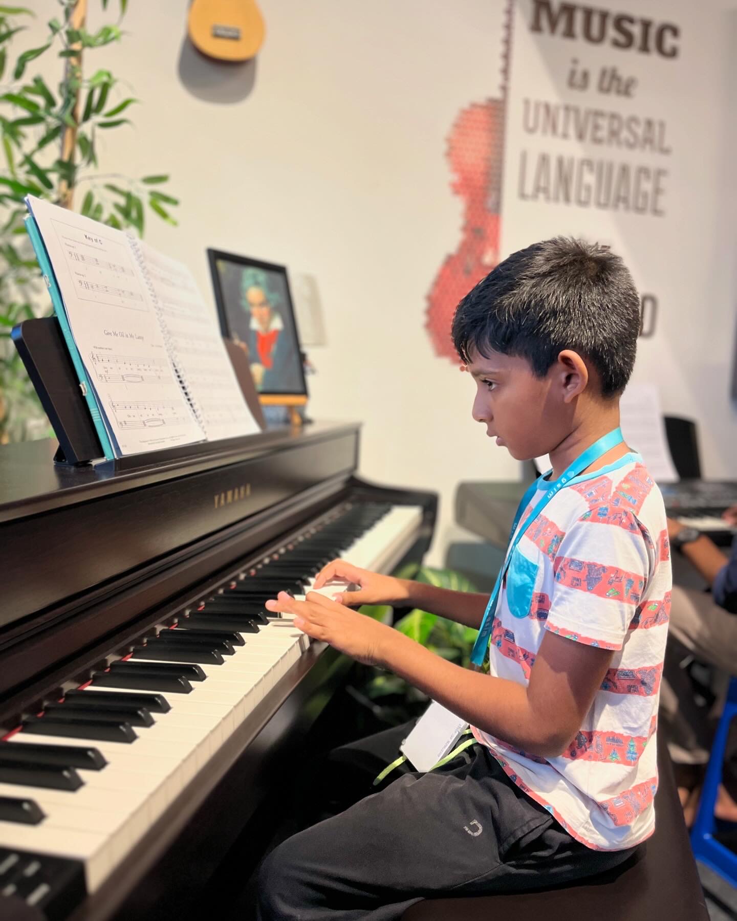 A montage of images depicting students playing instruments on the Academy rooftop